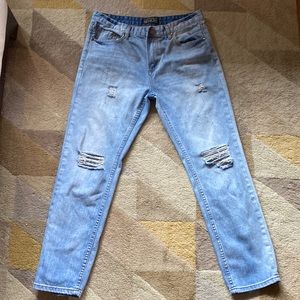 Distressed light wash skinny jeans